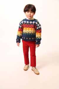 Boy a colorful knit sweater in multicolor Felt Wool Yarn, featuring a unique fair isle pattern. Designed with a classic crew neckline, relaxed fit, and dropped shoulders for all-day comfort and easy layering. Made from 100% Wool, ideal for winter wear. By Tia Cibani.