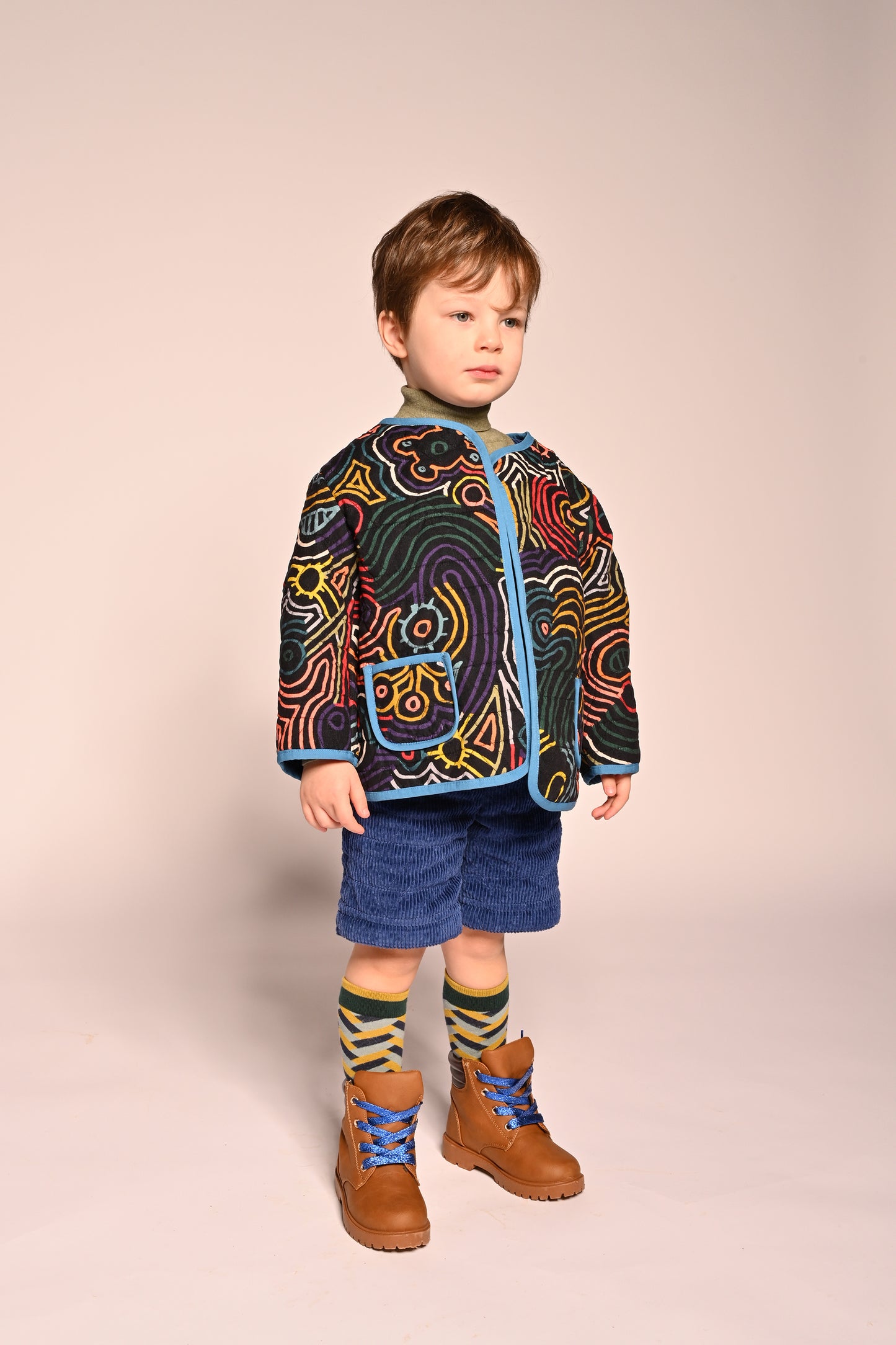 girls reversible corduroy cotton jacket in blue and multicolor print