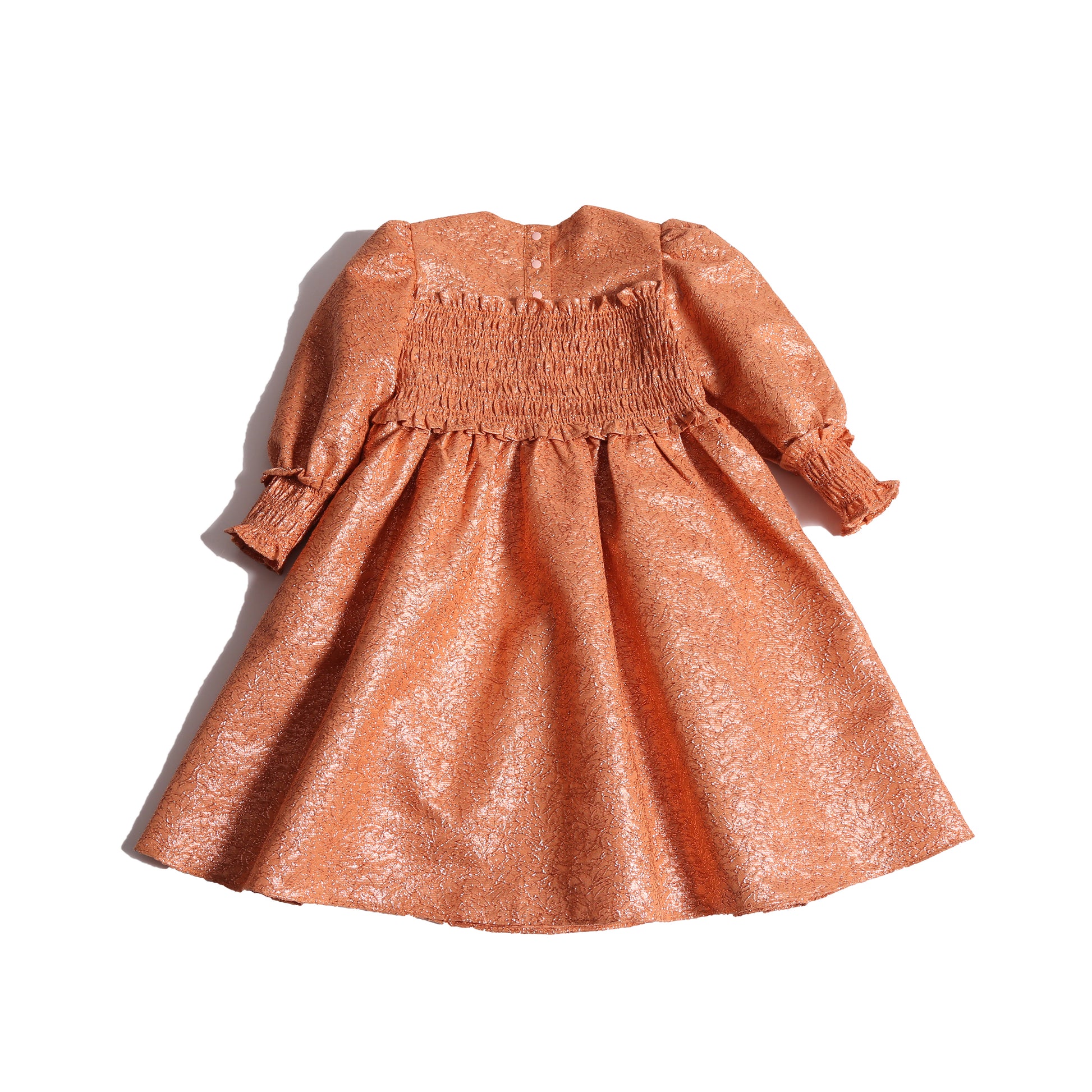 girls orange sparkly smocked dress with long sleeves