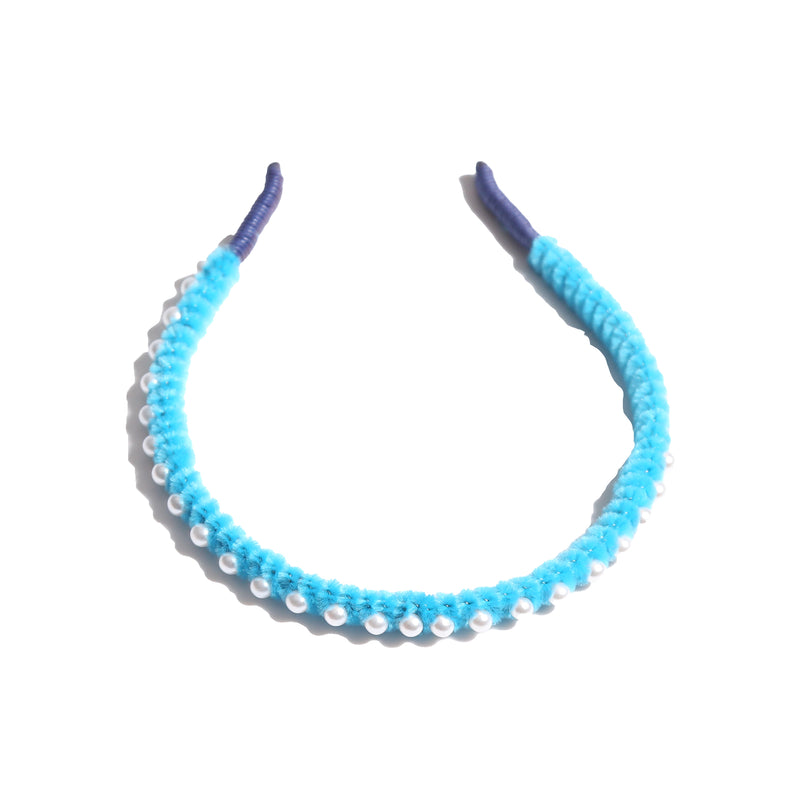 Vibrant chenille headband wrapped in playful pipe cleaners, lined with pearls at the crown, adding charm to any hairstyle. Colour: sky blue, Tia Cibani.