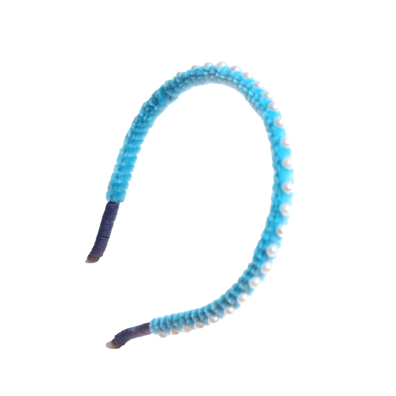 Vibrant chenille headband wrapped in playful pipe cleaners, lined with pearls at the crown, adding charm to any hairstyle. Colour: sky blue, Tia Cibani.