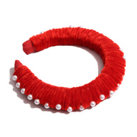 Oversized headband crafted with playful pipe cleaners, finished with delicately placed pearls at the crown. Colour: Rouge, Tia Cibani.