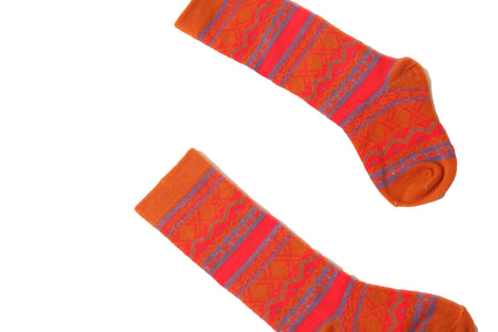 Multicolored midcalf socks with fair isle pattern in lightweight cotton knit with spandex for cozy, stretchy comfort. Colour: Red, blu, Tia Cibani.