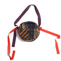 Timeless bum bag in Normanz print, featuring diamond harlequin tufting pattern. Multi-colored zipper, pockets with snaps, cotton canvas ribbon strap. Additional snap-tape strap for crossbody or waist wear as fanny pack. Rainbow, Tia Cibani.