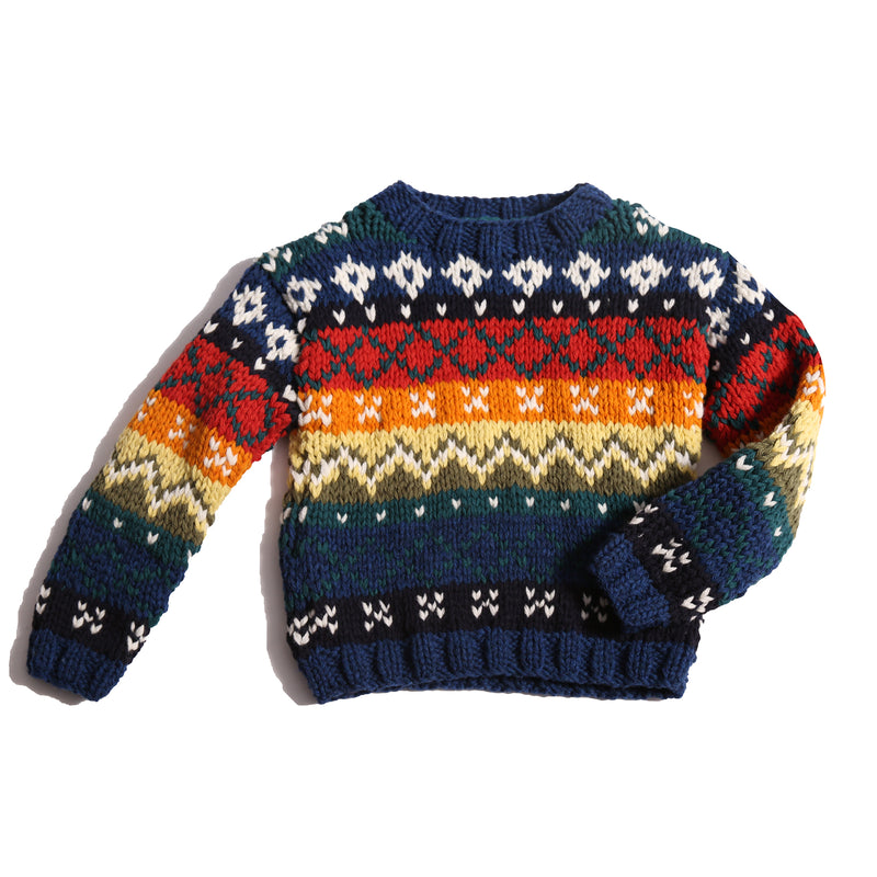 Colorful knit sweater in multicolor Felt Wool Yarn, featuring a unique fair isle pattern. Designed with a classic crew neckline, relaxed fit, and dropped shoulders for all-day comfort and easy layering. Made from 100% Wool, ideal for winter wear. By Tia Cibani.