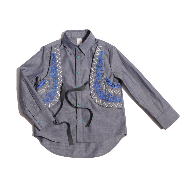Western-inspired take on classic boy's button-up with scoop high-low hem for modern twist. Built-in vest with two-toned embroidery design and textured ribbons at overlay. Snap closure at center front for easy dressing. Perfect for any occasion, from family gatherings to formal events. Cotton. Blue, Tia Cibani.