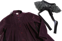 Oversized night shirt style dress, pin-tucked at the top with a darling high-low hem, featuring a detachable embroidered lace pleated collar at the mock neckline. Made from velvet fabric in Prune color, ideal for occasional wear or everyday dress up, with snap buttons and handy pockets at the sides, by Tia Cibani. Detail.