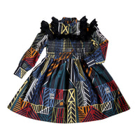 Flared long sleeve frock in this season's Normanz print on soft corduroy features black color smocking at the bodice, Multicolour, Tia Cibani.