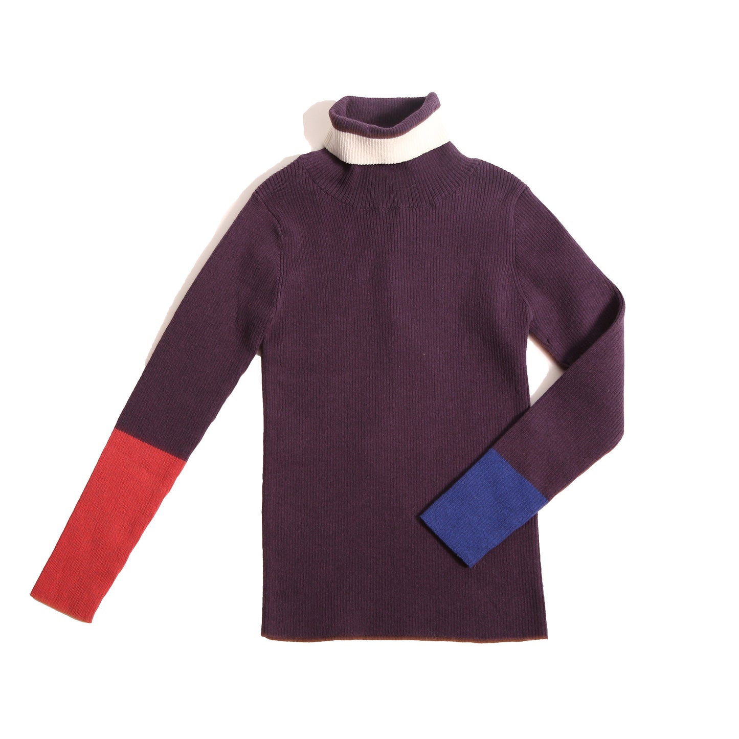 Slim fit, all-over ribbed turtleneck featuring colorblocking and contrast patchwork detailing at sleeves and neckline in this season's fine knit yarn colors. Ideal for wearing alone or as a layering piece in chilly seasons. Prune mix, Tia Cibani.